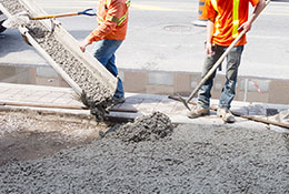 workers pouring cement