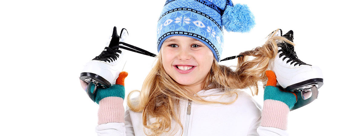 girl holding skates up