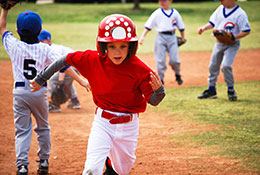 kid running in baseball